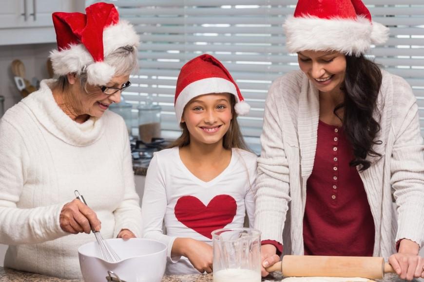 Family making cookies for holidays