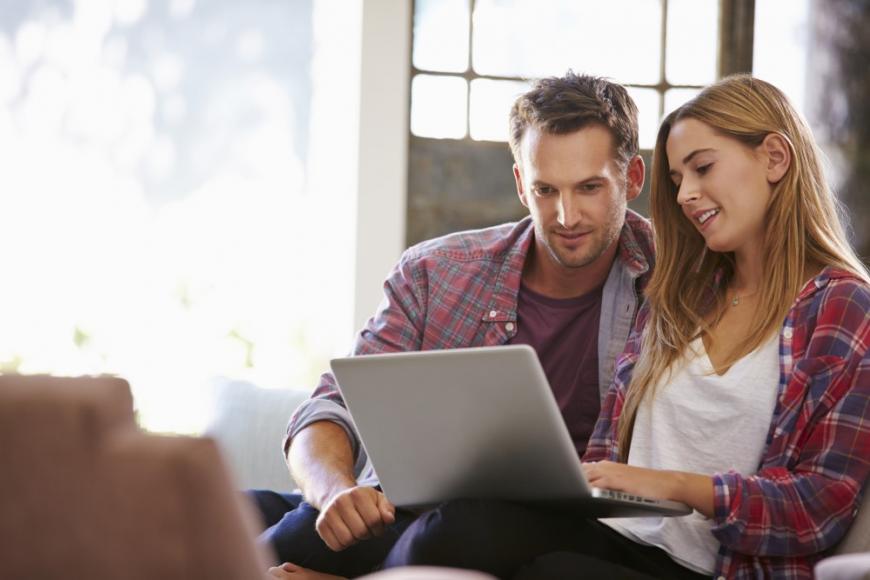 Young couple on laptop
