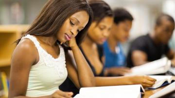 Blakc college students studying